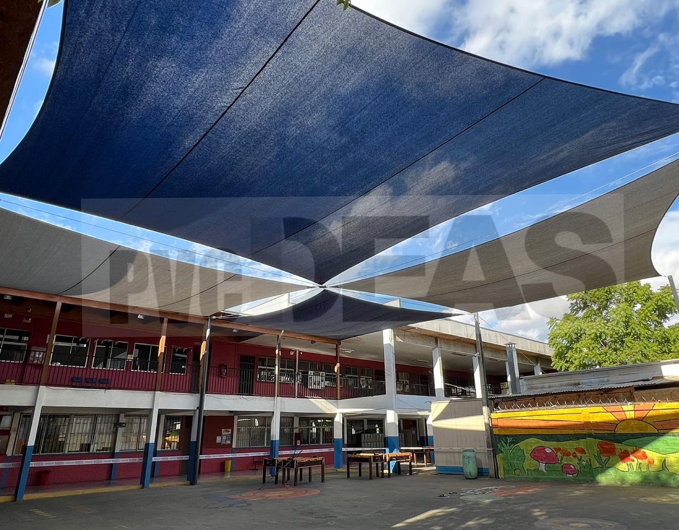 Toldo vela colegio